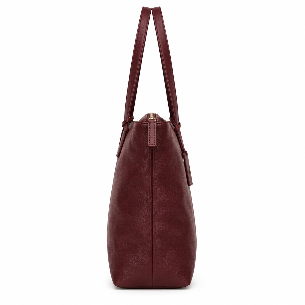 Side view of burgundy sheepskin leather tote bag showing leather gusset and handles